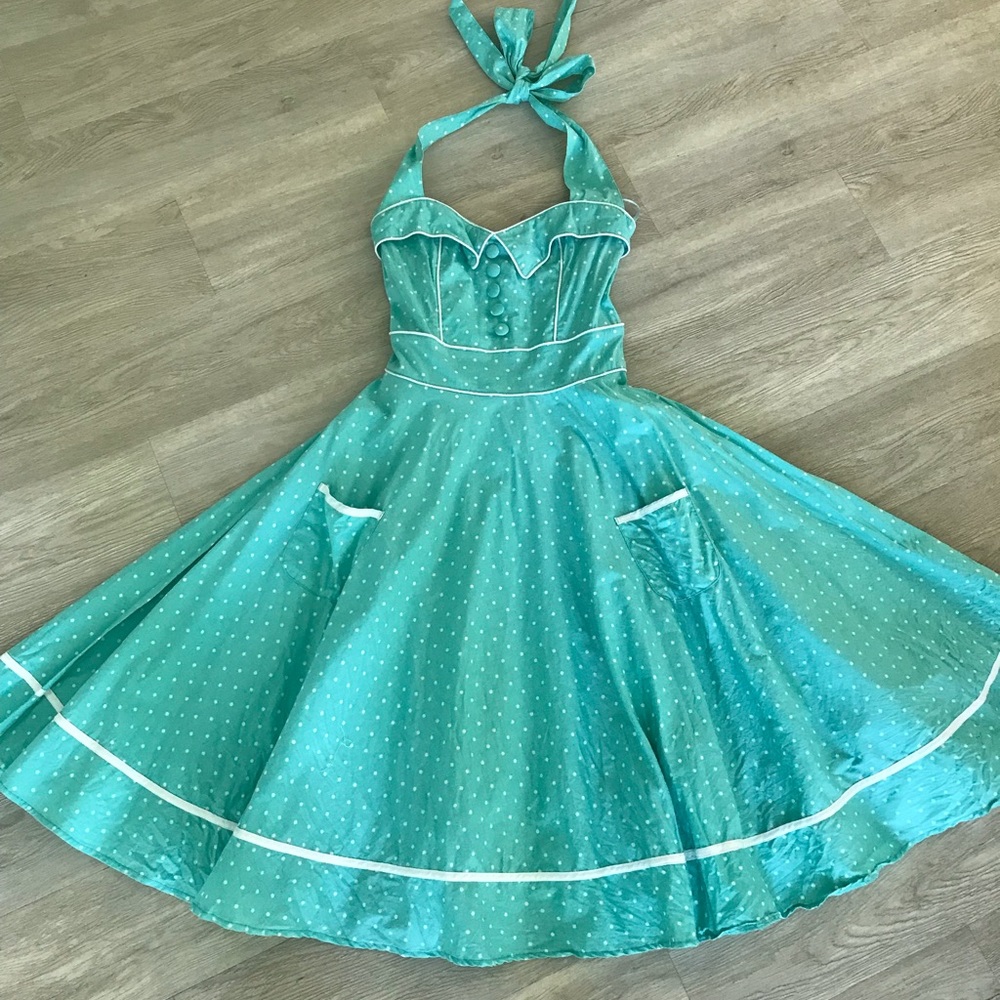 Turquoise Hell Bunny Vixen halter swing dress.